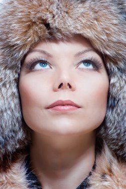 Woman in fur hat clipart