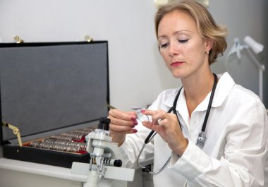 Female doctor in laboratory clipart