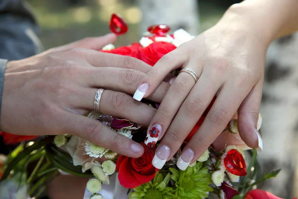 Hands of newlyweds — Stock Photo, Image