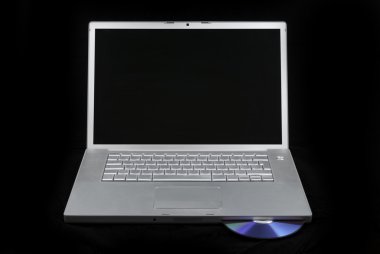Laptop isolated with CD clipart