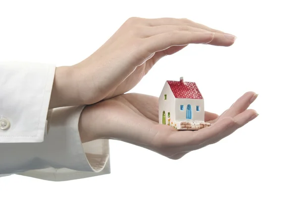 Hands with a little house — Stock Photo, Image