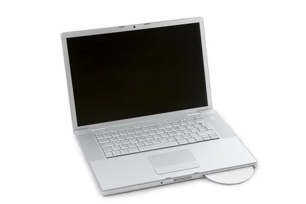 Laptop isolated with CD — Stock Photo, Image
