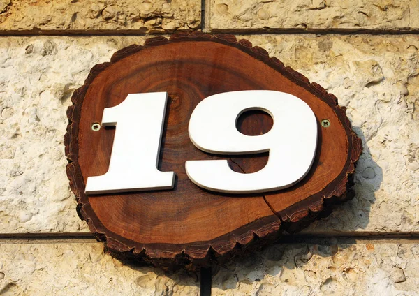 stock image Number 19 on wall