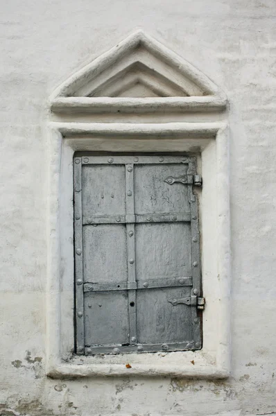 stock image Single iron window on wall