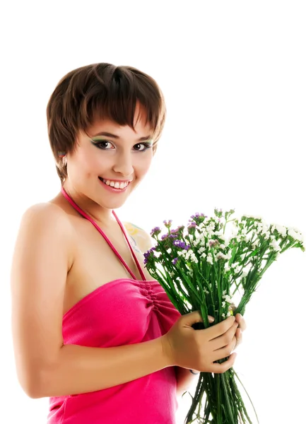 Mujer joven con flores silvestres — Foto de Stock