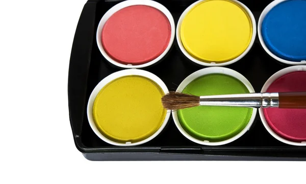 Box of watercolors and paintbrush — Stock Photo, Image