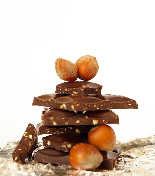 Chocolate blocks and nuts — Stock Photo, Image