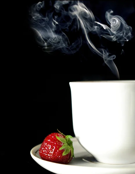 Coffee and strawberry on black — Stock Photo, Image
