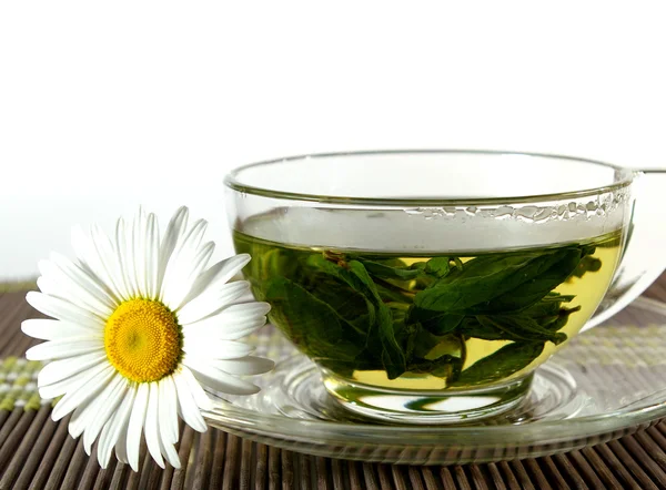 Xícara de chá e camomila — Fotografia de Stock