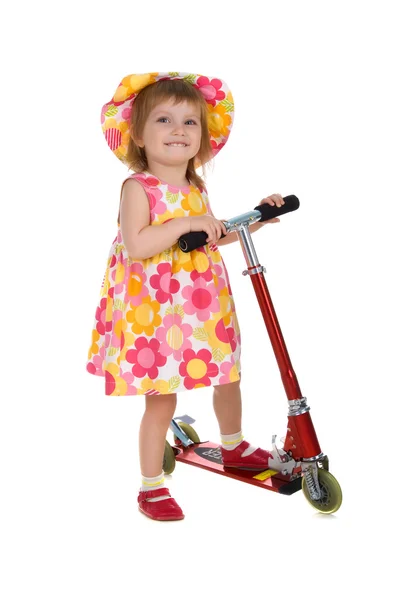 Ładny dziewczyna i jej scooter — Zdjęcie stockowe