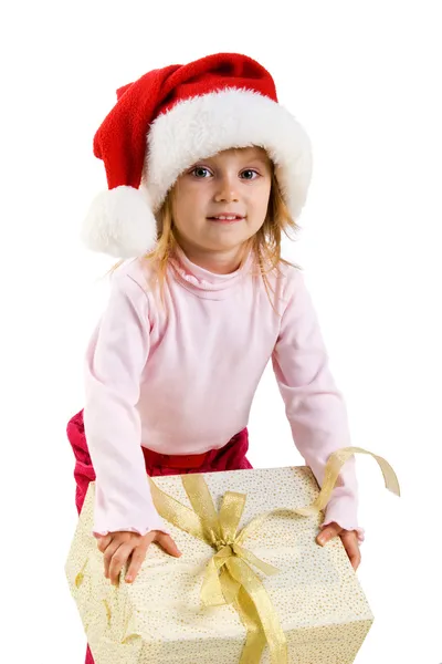 可爱的女孩与一个圣诞礼物 — 图库照片