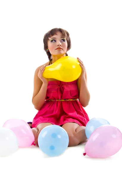 Roztomilá mladá dívka s balónky — Stock fotografie