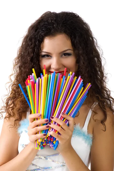 Linda mujer joven sostiene una gran cantidad de colorido — Foto de Stock