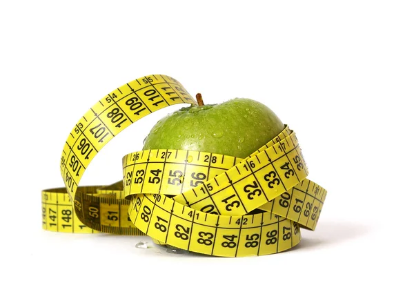 Pomme verte et ruban à mesurer — Photo