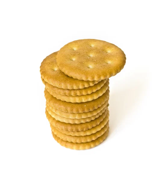 Haldy sušenky na bílém pozadí — Stock fotografie