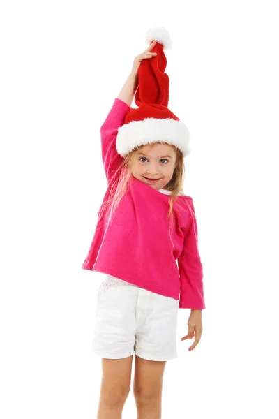 Söt flicka i en jultomten hatt — Stockfoto