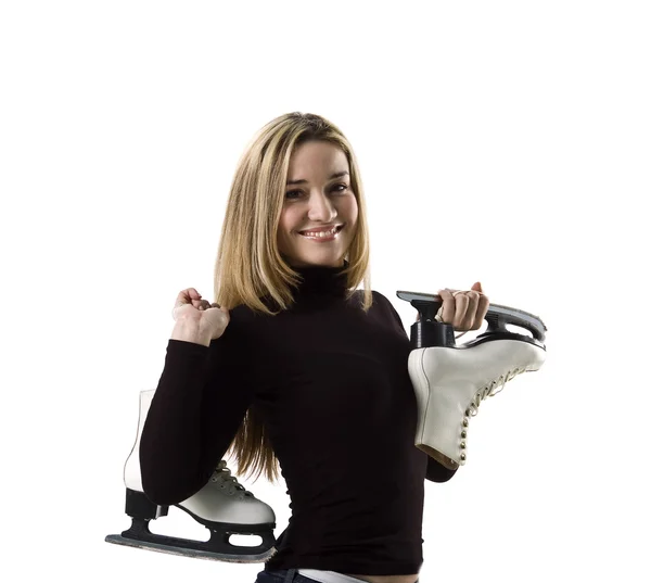 Mooie vrouw en schaatsen — Stockfoto