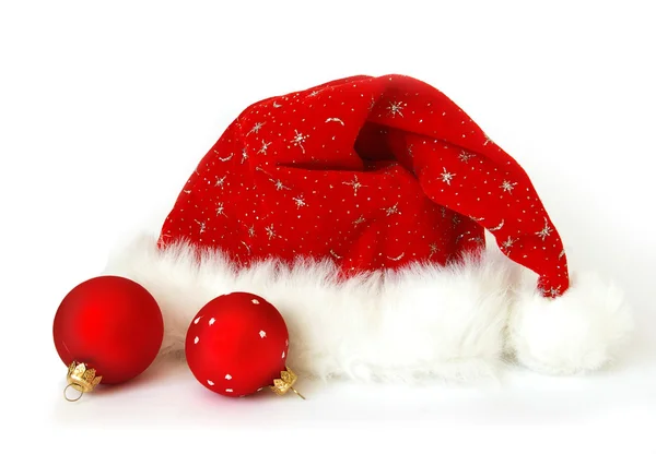 Jultomten hatt och sfärer — Stockfoto
