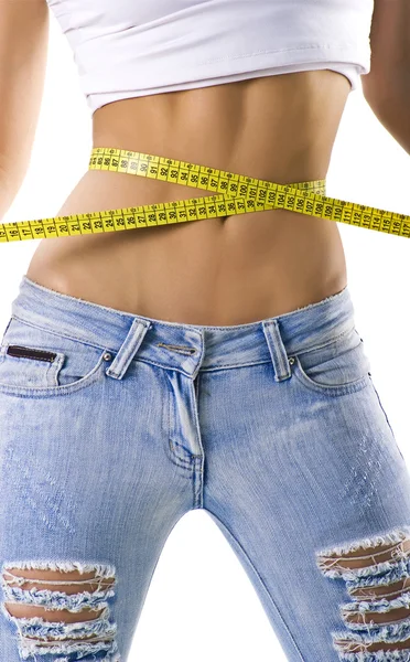 Woman measuring waist — Stock Photo, Image