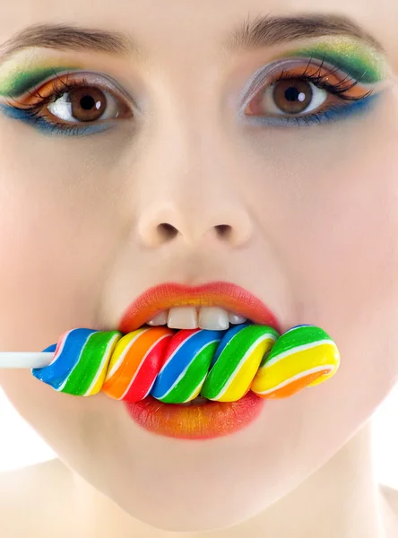 Woman with bright candy close-up — Stock Photo, Image