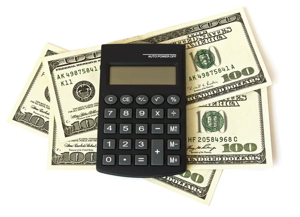 Dólares e calculadora — Fotografia de Stock