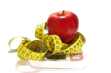 Apple and tape measure isolared clipart