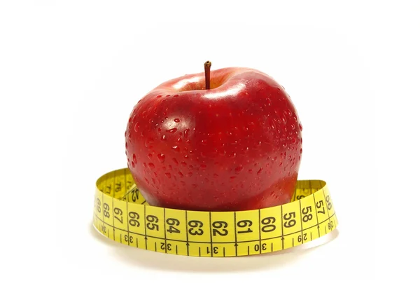 Elma ve şerit metre isolared — Stok fotoğraf