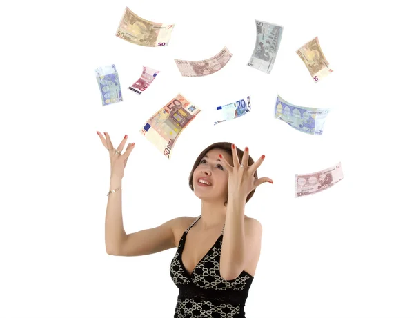 Hermosa mujer joven arrojando dinero en —  Fotos de Stock