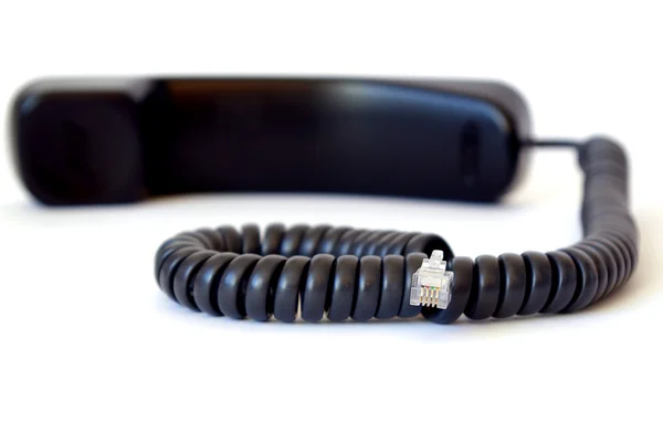 Telefono nero su sfondo bianco — Foto Stock