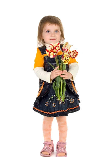 Linda chica dando tulipanes — Foto de Stock