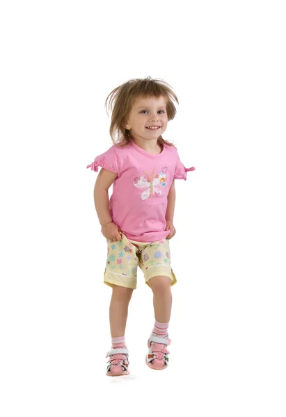 Schattig klein meisje springt — Stockfoto