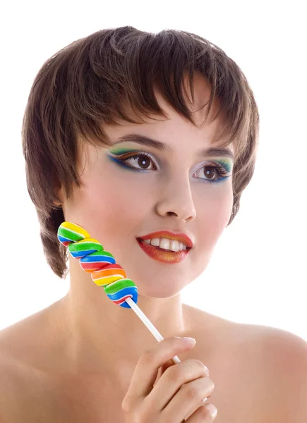Мила жінка з яскравими цукерками — стокове фото