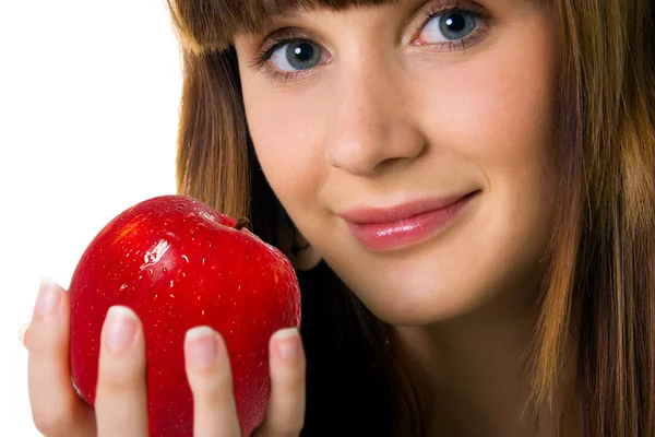 Słodkie kobiety z czerwonym jabłkiem — Zdjęcie stockowe