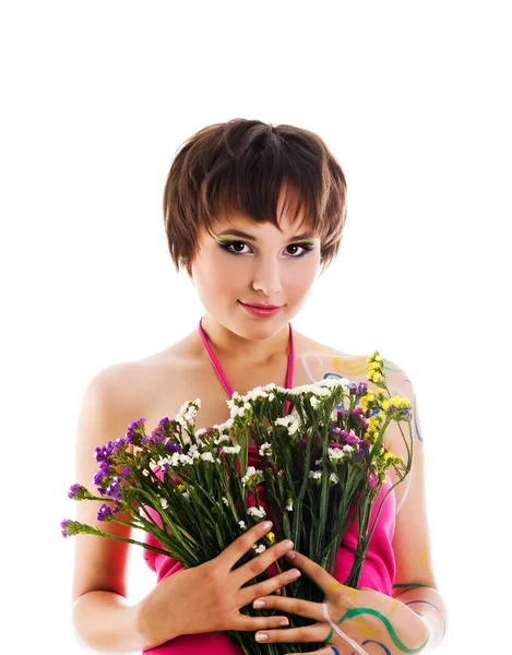 Sevimli genç kız çiçekleri ile — Stok fotoğraf