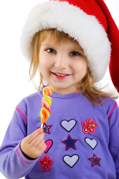 Girl in the santa claus hat — Stock Photo, Image