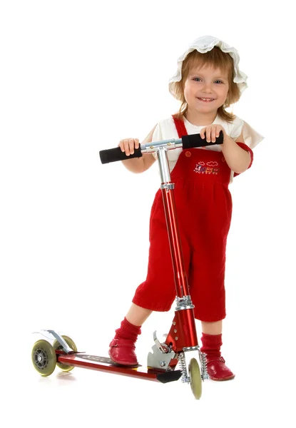 Little girl and her scooter — Stock Photo, Image