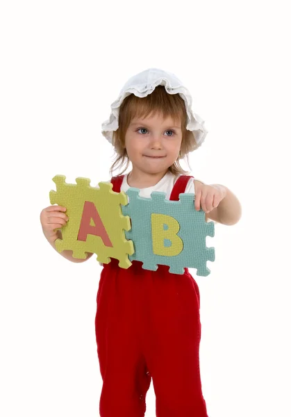 Kislány és a betűk — Stock Fotó