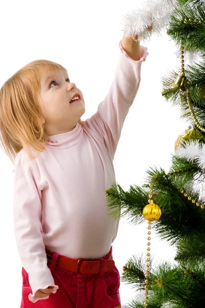 Κοριτσάκι κοντά το χριστουγεννιάτικο δέντρο και — Φωτογραφία Αρχείου