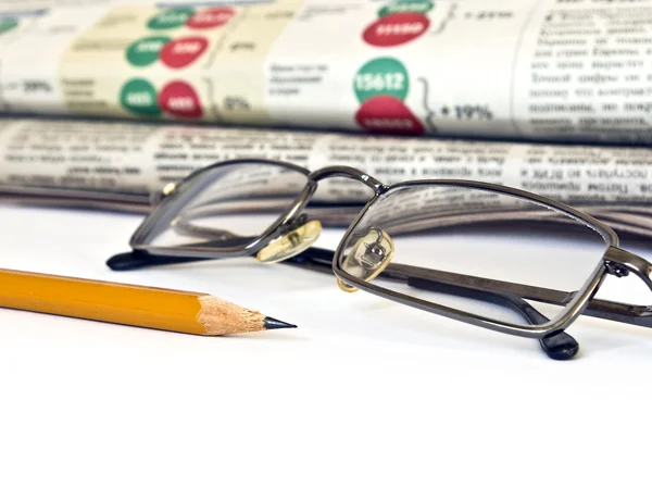 Newspaper and pencil — Stock Photo, Image