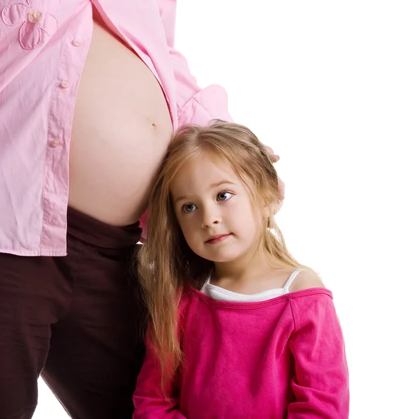 Niza niña y su madre embarazada — Foto de Stock