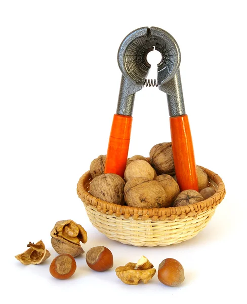 Nutcracker and nuts isolated — Stock Photo, Image
