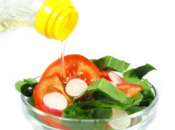 Olive oil and salad — Stock Photo, Image