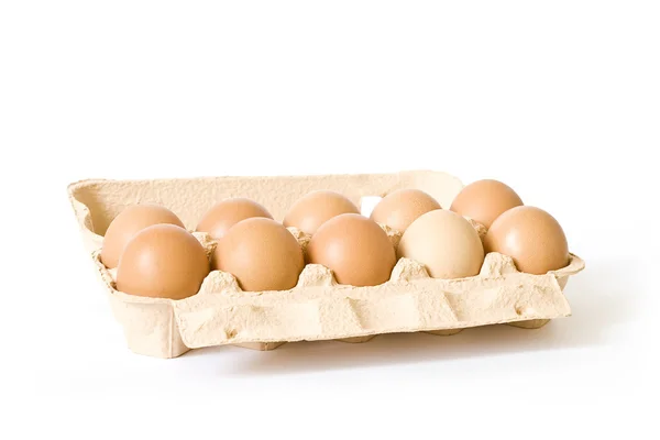 Imballaggio di uova su bianco — Foto Stock