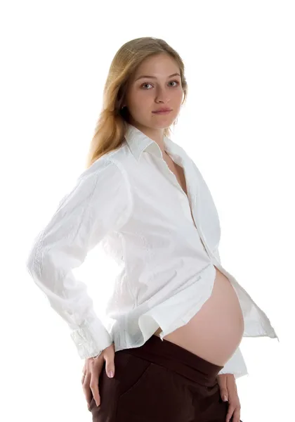 Беременная красивая женщина — стоковое фото