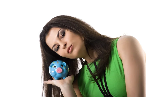 Ładna kobieta trzymać piggy bank — Zdjęcie stockowe
