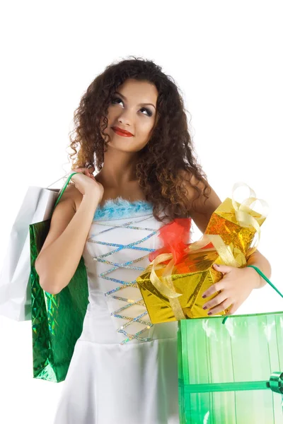 Pretty woman with a christmas gifts — Stock Photo, Image