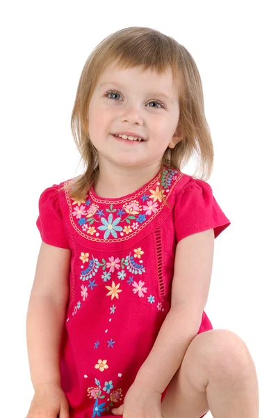 Добре одягнена маленька дівчинка ізольована — стокове фото