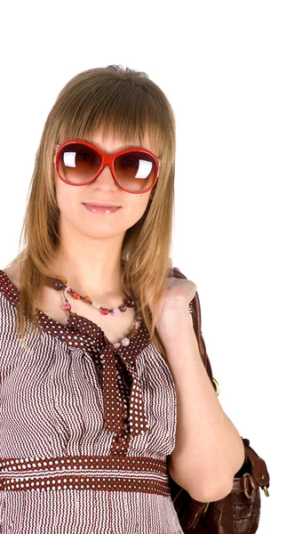 Femme en lunettes de soleil avec sac — Photo
