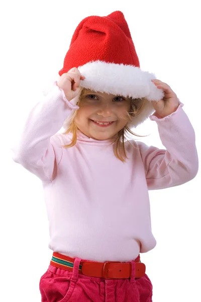 Little girl in the santa claus hat Stock Image