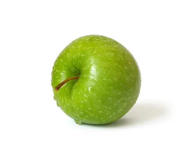 Зелене яблуко на білому тлі — стокове фото